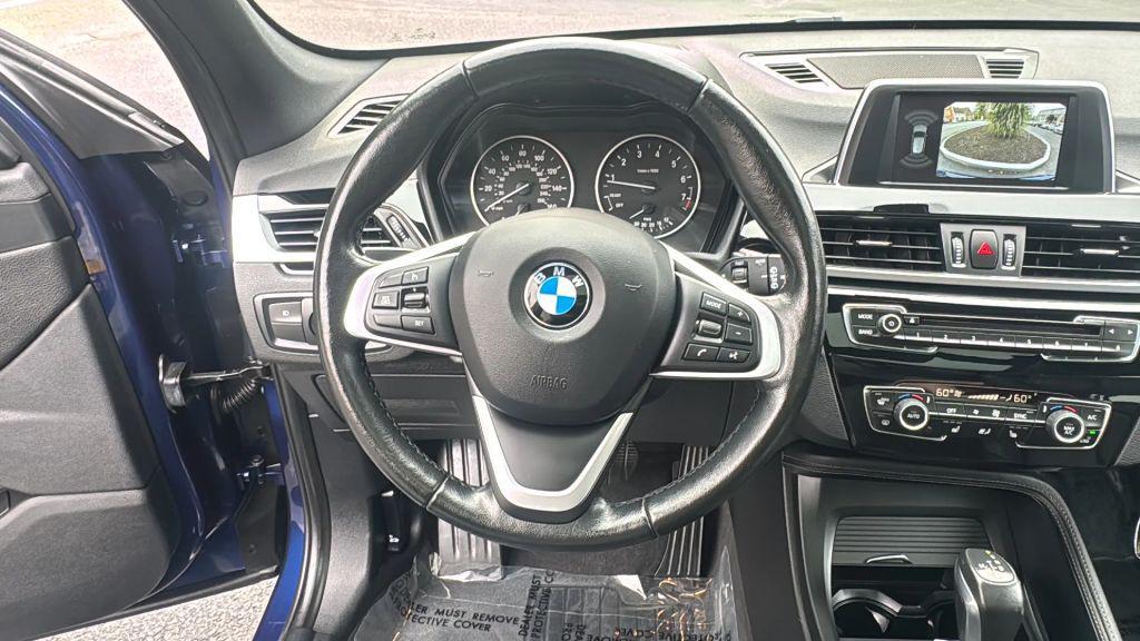 used 2018 BMW X1 car, priced at $20,195