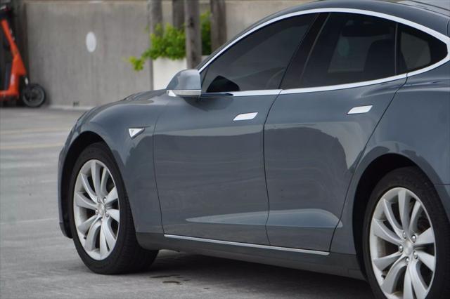 used 2013 Tesla Model S car, priced at $11,395
