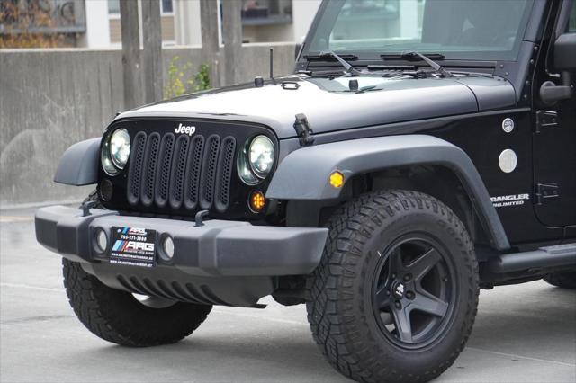 used 2012 Jeep Wrangler Unlimited car, priced at $15,795