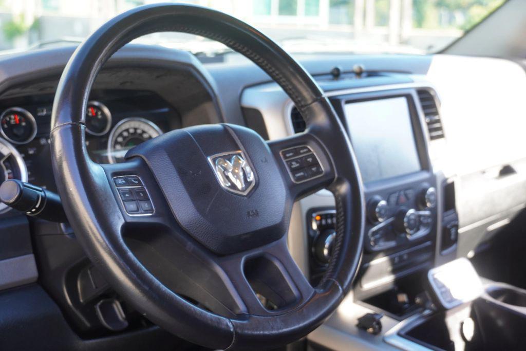 used 2015 Ram 1500 car, priced at $21,495