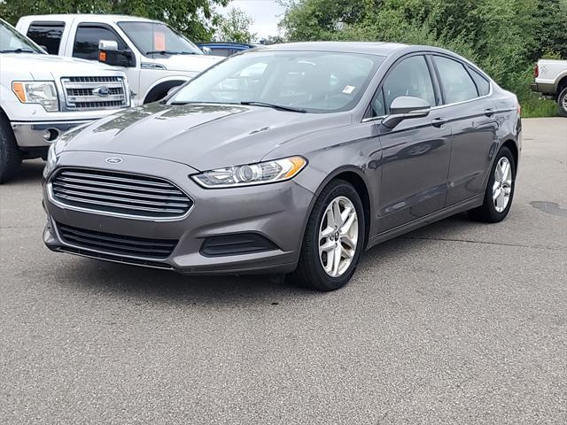 used 2014 Ford Fusion car, priced at $8,000