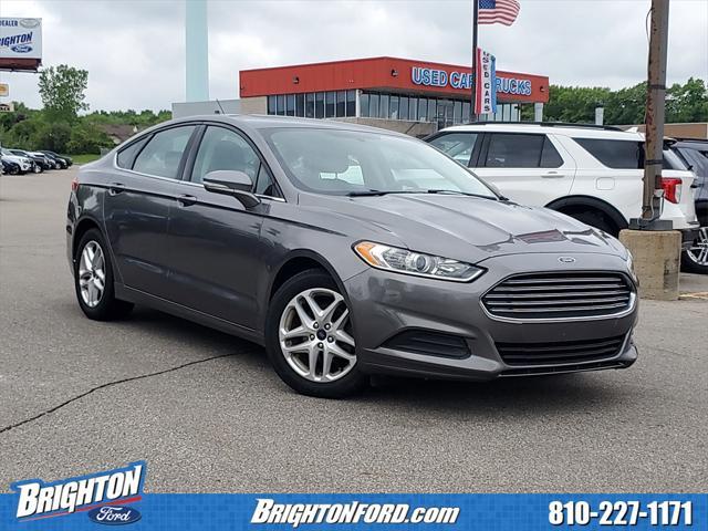 used 2014 Ford Fusion car, priced at $8,000