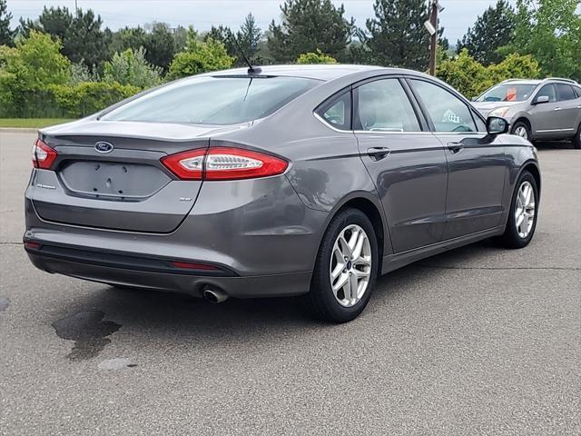 used 2014 Ford Fusion car, priced at $8,000