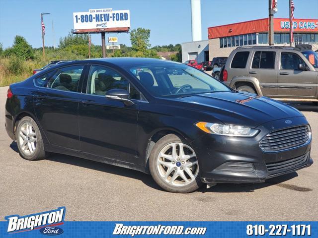 used 2014 Ford Fusion car, priced at $4,400