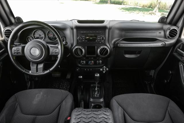 used 2013 Jeep Wrangler Unlimited car, priced at $16,991