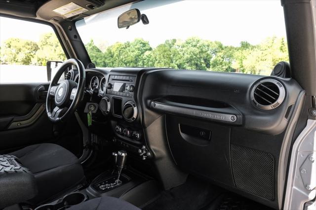 used 2013 Jeep Wrangler Unlimited car, priced at $16,991