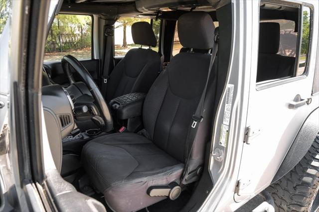 used 2013 Jeep Wrangler Unlimited car, priced at $16,991