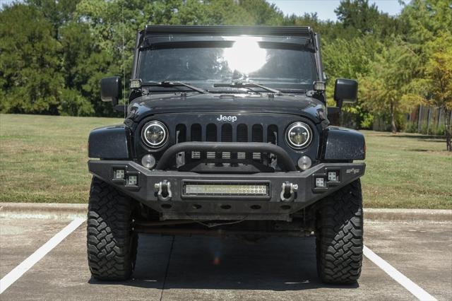 used 2015 Jeep Wrangler Unlimited car, priced at $18,741