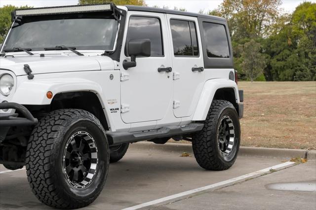 used 2014 Jeep Wrangler Unlimited car, priced at $16,491