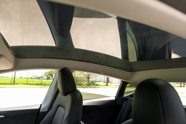 used 2024 Tesla Model Y car, priced at $34,741