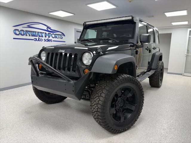 used 2013 Jeep Wrangler Unlimited car, priced at $18,995