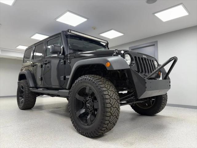 used 2013 Jeep Wrangler Unlimited car, priced at $18,995