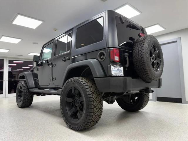 used 2013 Jeep Wrangler Unlimited car, priced at $18,995