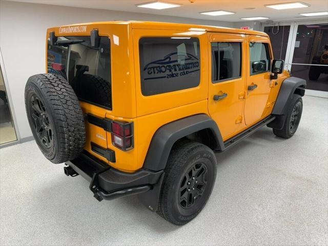 used 2013 Jeep Wrangler Unlimited car, priced at $19,495