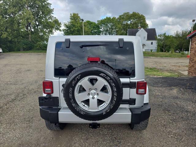 used 2012 Jeep Wrangler Unlimited car, priced at $16,700