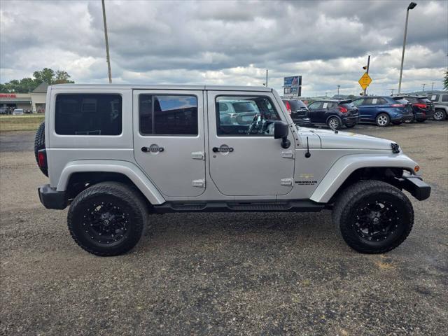 used 2012 Jeep Wrangler Unlimited car, priced at $16,700