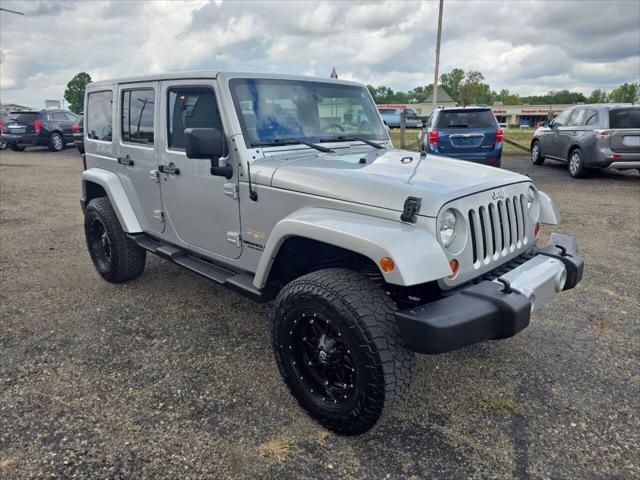 used 2012 Jeep Wrangler Unlimited car, priced at $16,700