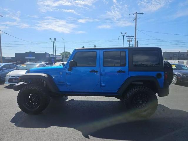 used 2015 Jeep Wrangler Unlimited car, priced at $16,961