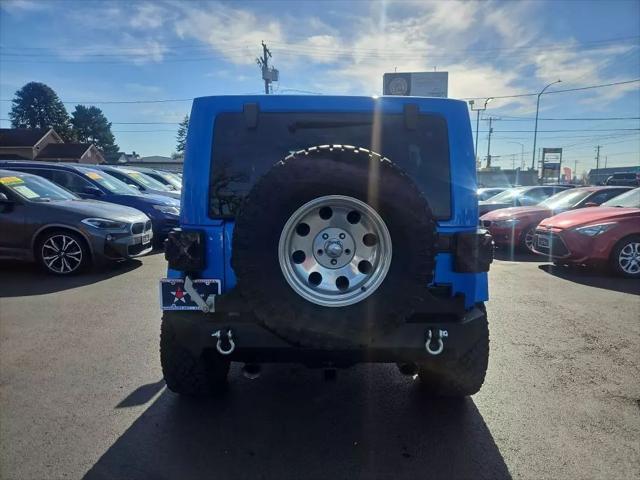 used 2014 Jeep Wrangler Unlimited car, priced at $19,977