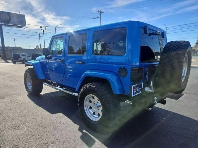 used 2014 Jeep Wrangler Unlimited car, priced at $19,977