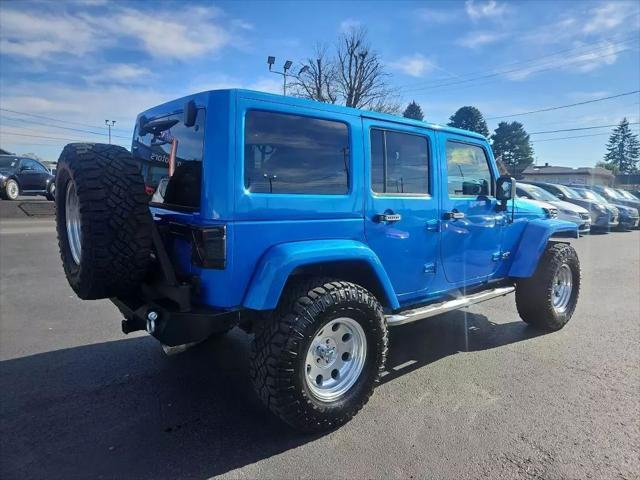 used 2014 Jeep Wrangler Unlimited car, priced at $19,977