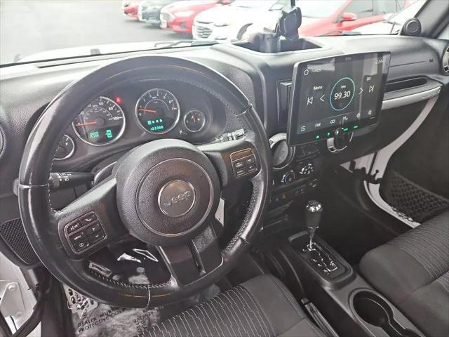 used 2012 Jeep Wrangler Unlimited car, priced at $16,961