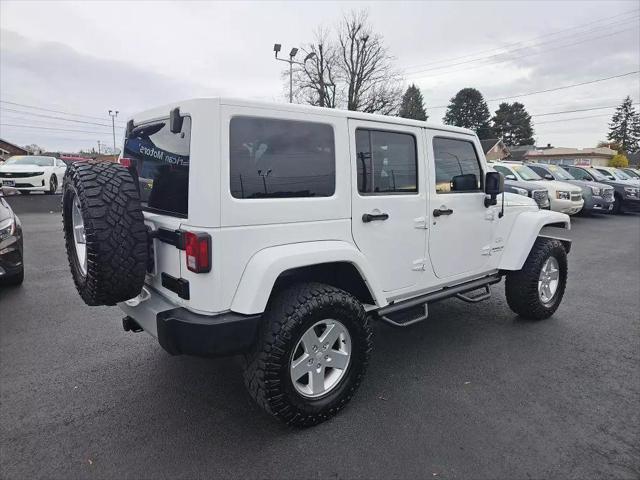 used 2012 Jeep Wrangler Unlimited car, priced at $16,961