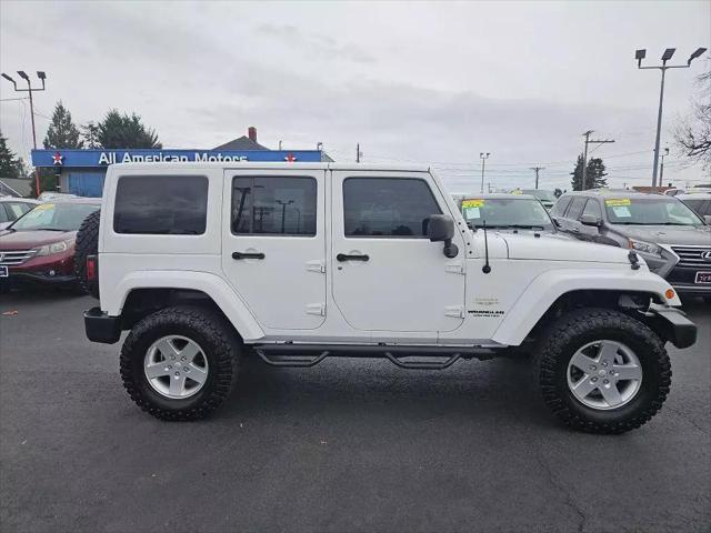 used 2012 Jeep Wrangler Unlimited car, priced at $16,961