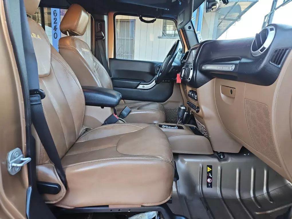 used 2015 Jeep Wrangler Unlimited car, priced at $17,971