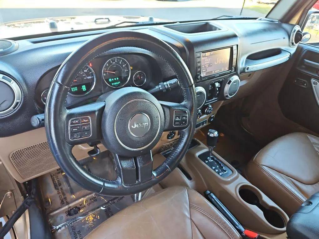 used 2015 Jeep Wrangler Unlimited car, priced at $17,971