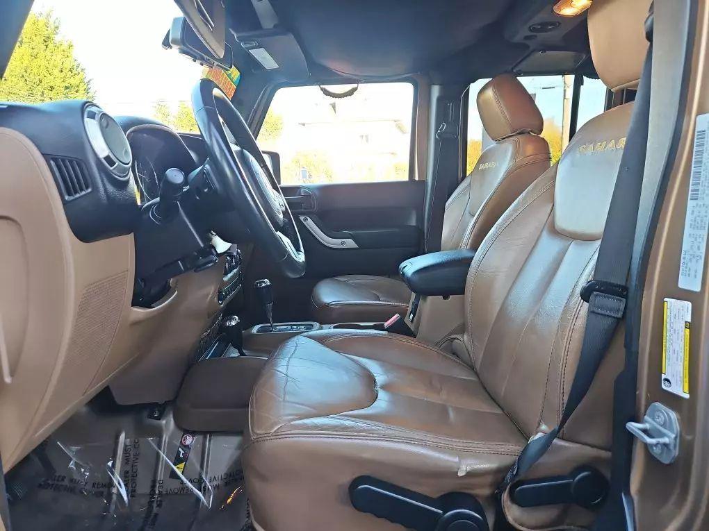 used 2015 Jeep Wrangler Unlimited car, priced at $17,971