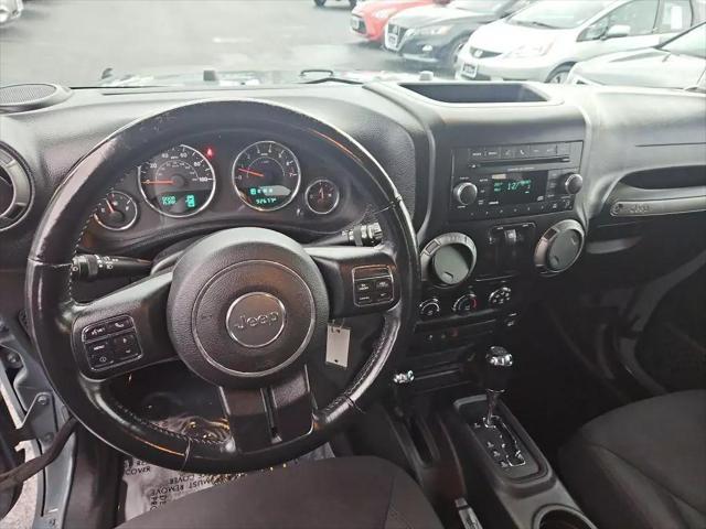 used 2015 Jeep Wrangler car, priced at $21,612