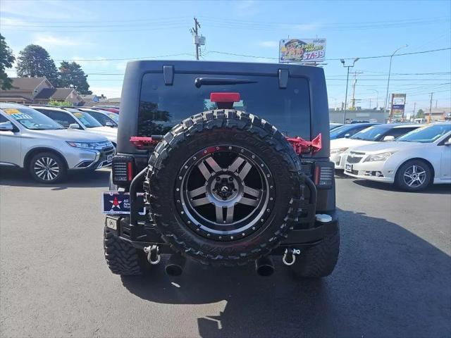 used 2013 Jeep Wrangler Unlimited car, priced at $21,912