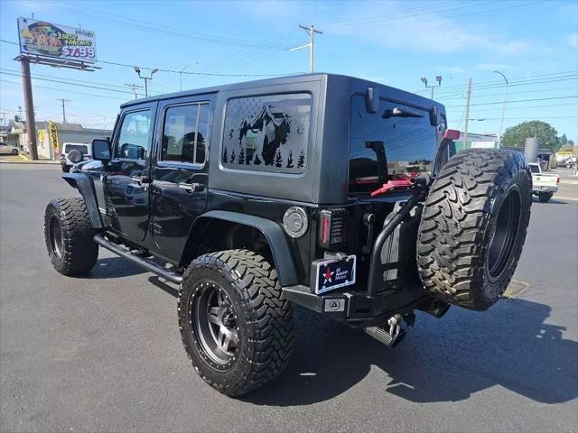 used 2013 Jeep Wrangler Unlimited car, priced at $21,912