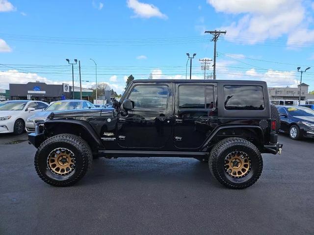 used 2014 Jeep Wrangler Unlimited car, priced at $21,912