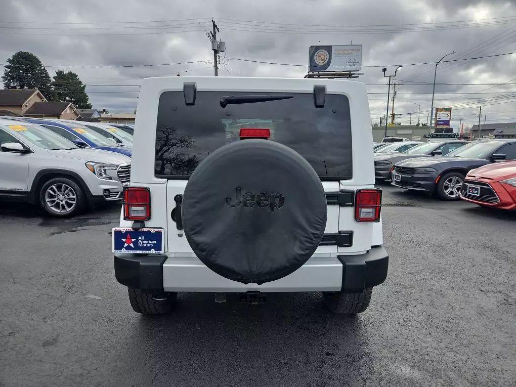 used 2012 Jeep Wrangler Unlimited car, priced at $14,977