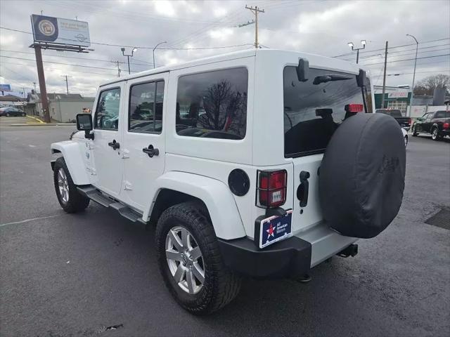 used 2012 Jeep Wrangler Unlimited car, priced at $19,977