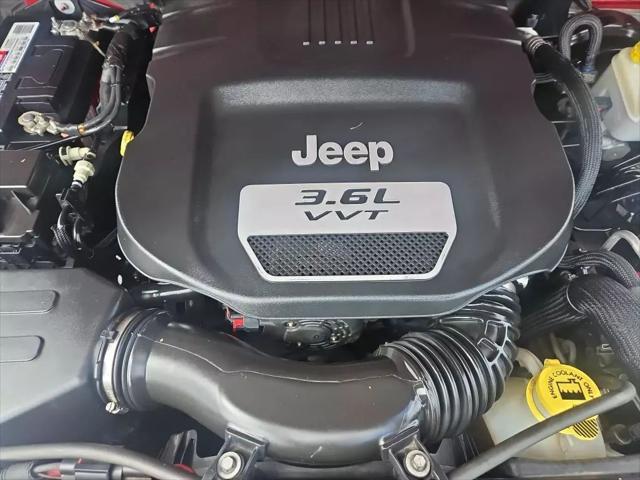 used 2013 Jeep Wrangler Unlimited car, priced at $16,261