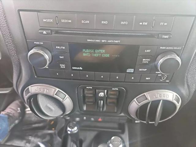 used 2013 Jeep Wrangler Unlimited car, priced at $16,261
