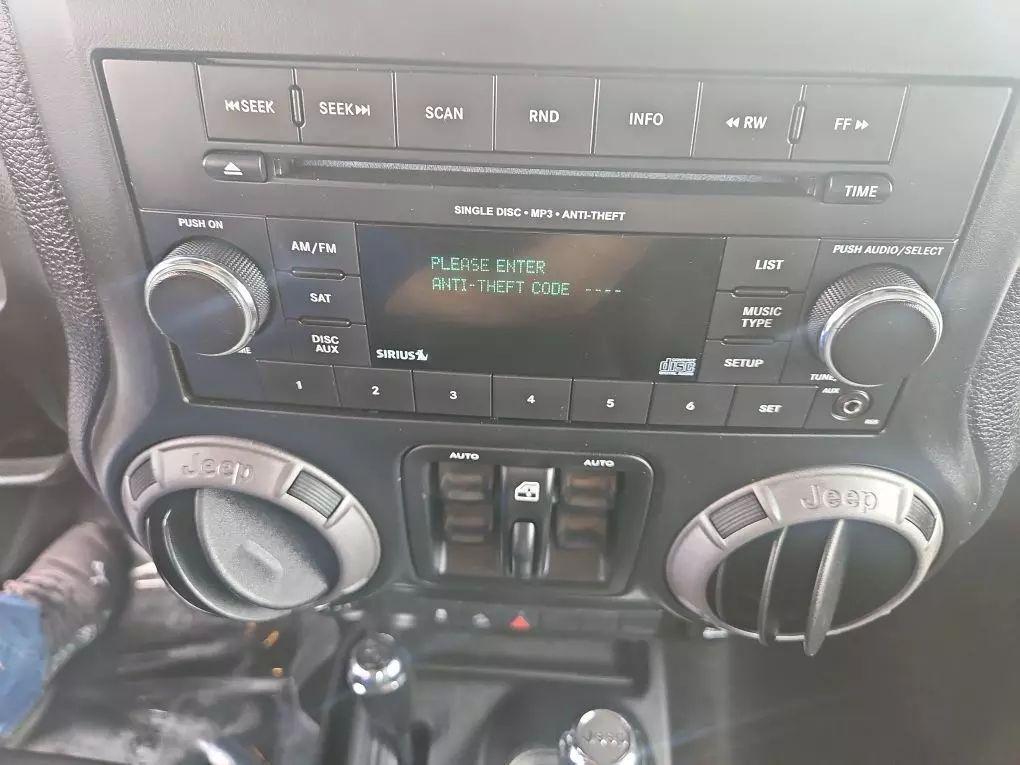 used 2013 Jeep Wrangler Unlimited car, priced at $14,977