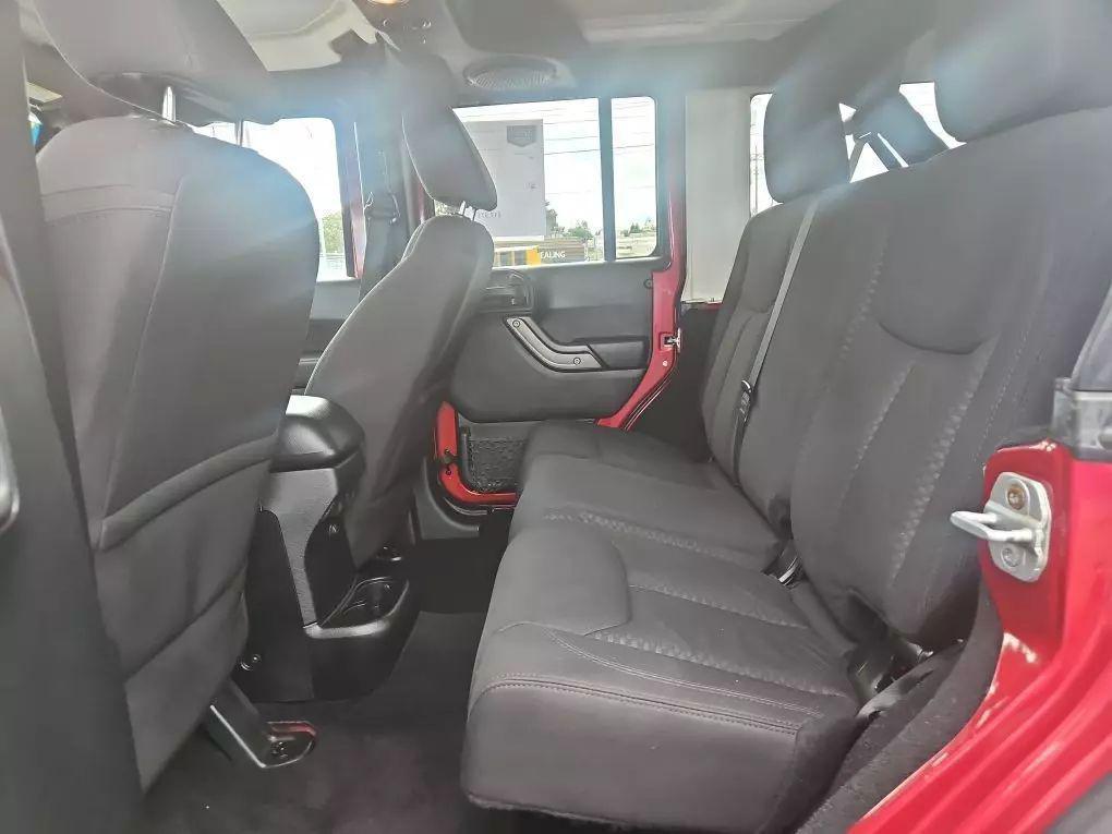 used 2013 Jeep Wrangler Unlimited car, priced at $14,977