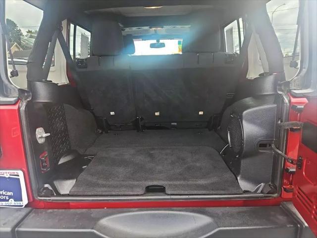 used 2013 Jeep Wrangler Unlimited car, priced at $16,261