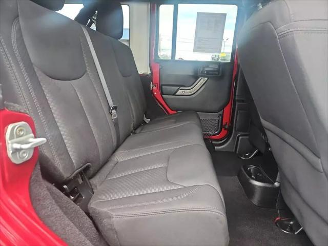used 2013 Jeep Wrangler Unlimited car, priced at $16,261
