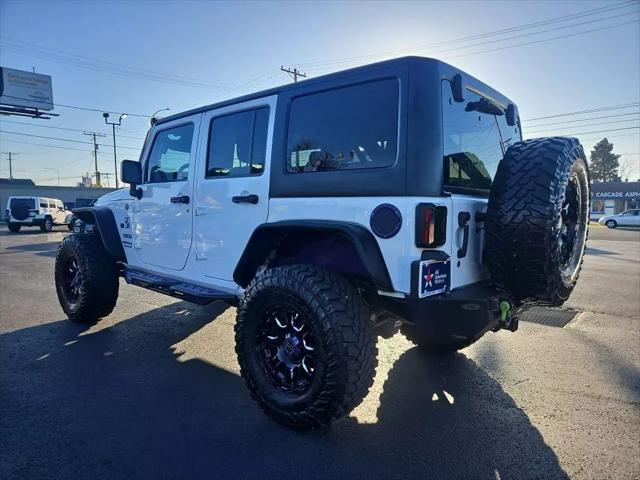 used 2014 Jeep Wrangler Unlimited car, priced at $19,995