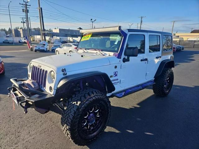 used 2014 Jeep Wrangler Unlimited car, priced at $19,995