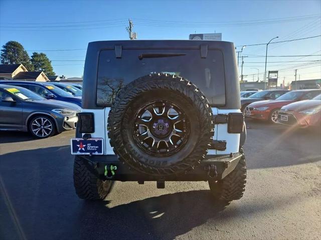 used 2014 Jeep Wrangler Unlimited car, priced at $19,995