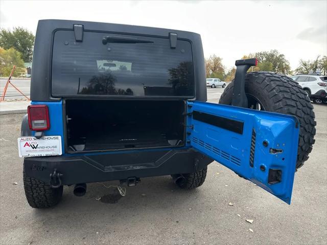 used 2011 Jeep Wrangler Unlimited car, priced at $15,998