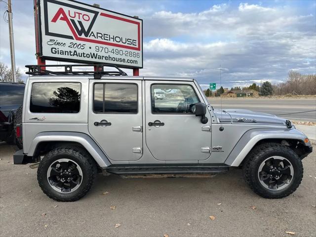 used 2014 Jeep Wrangler Unlimited car, priced at $18,998