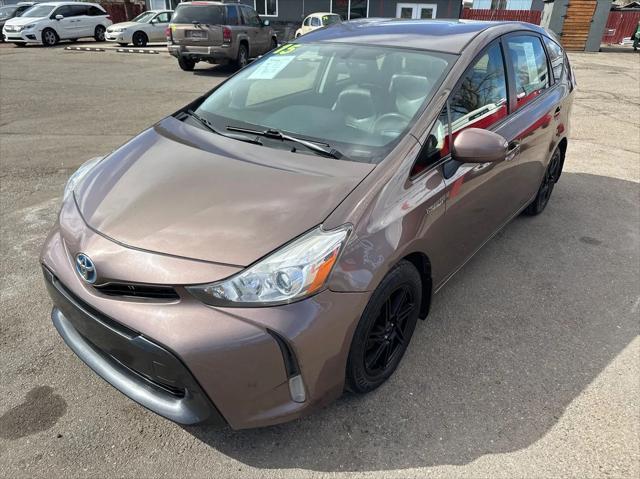used 2015 Toyota Prius v car, priced at $9,999