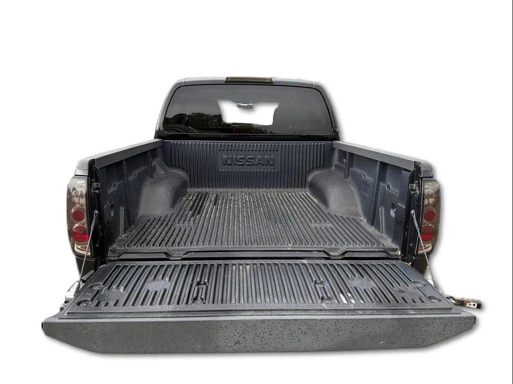 used 2013 Nissan Frontier car, priced at $12,998